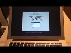 Macbook stuck on apple